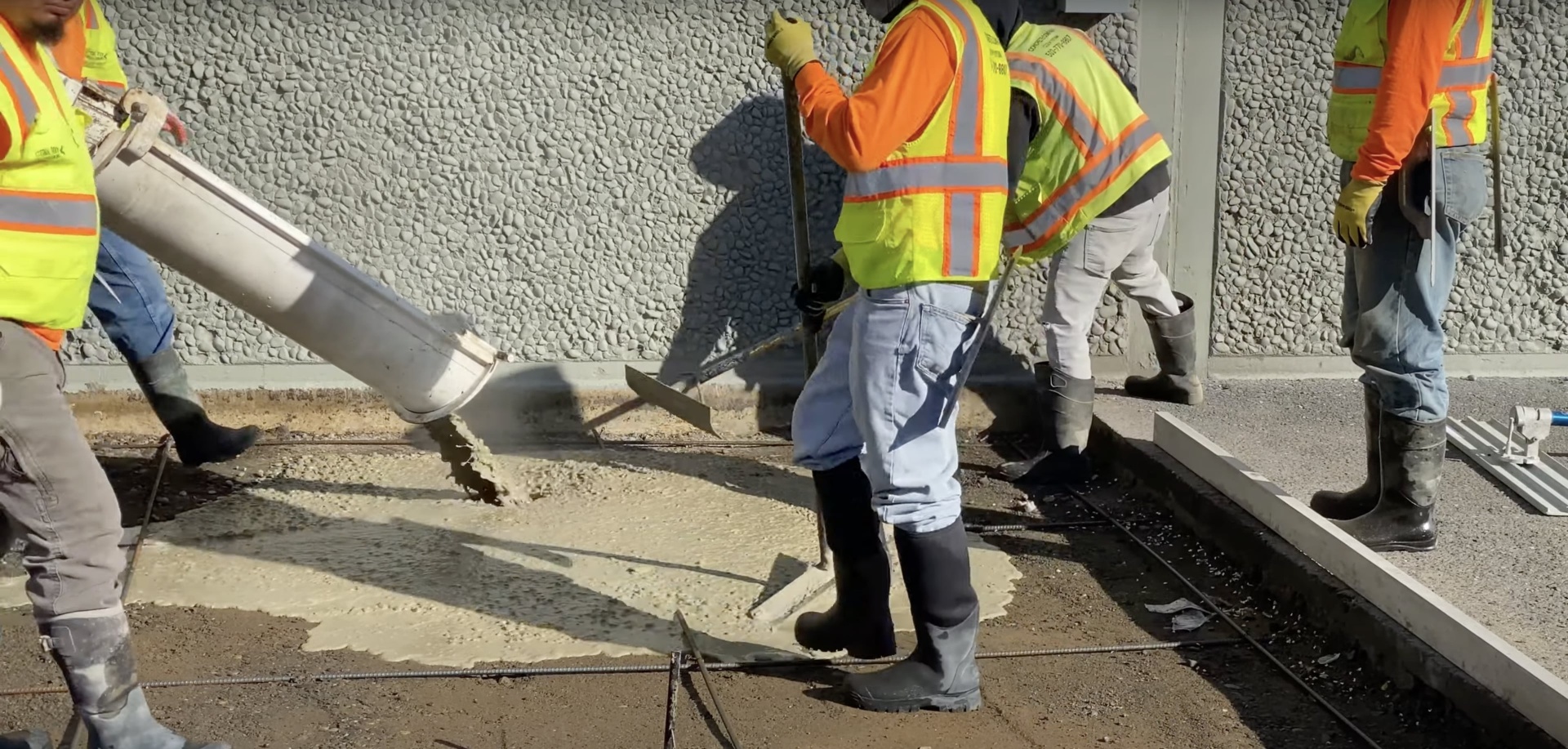 Professional concrete crew working on commercial concrete project